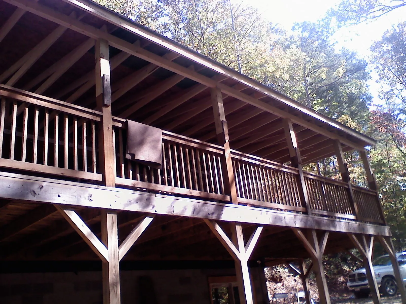 Timber framing under a new elevated porch and deck — Roof Leak Repair in Attleboro by Roofing Brothers